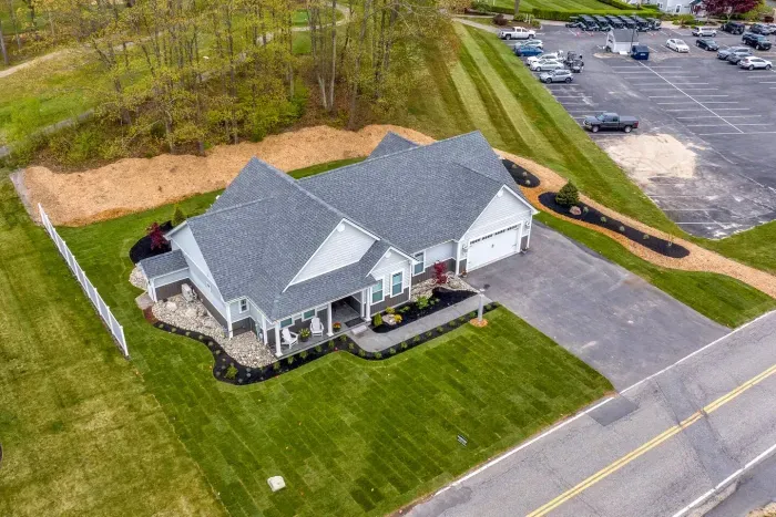 Enjoy the expansive outdoor space with a sunny lawn, patio dining set, Adirondack chairs, and a grill—perfect for barbecues, relaxing afternoons, and memorable evenings with friends and family.
