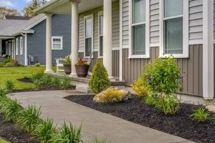 Enjoy the expansive outdoor space with a sunny lawn, patio dining set, Adirondack chairs, and a grill—perfect for barbecues, relaxing afternoons, and memorable evenings with friends and family.