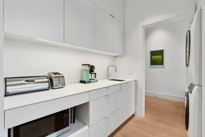 Kitchenette off the main kitche. Washer and dryer as well. 