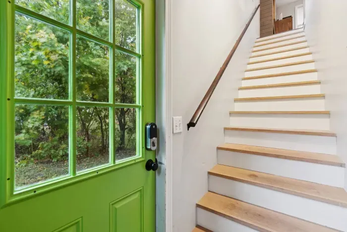 Come through the green door and up the steps to the apartment. Key code provided for easy access. 