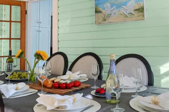 The dining area boasts a blend of vintage elegance and modern flair, with comfortable seating and beautiful details that set the stage for memorable meals.