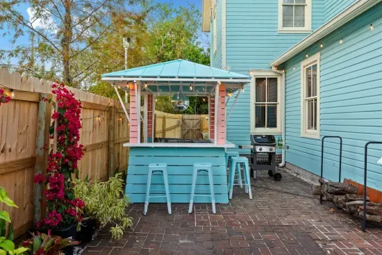 The vibrant outdoor bar is a party-ready centerpiece for your evenings. With its cheerful colors, a disco ball, and charming string lights, it’s ideal for mixing up your favorite cocktails or enjoying drinks with friends.