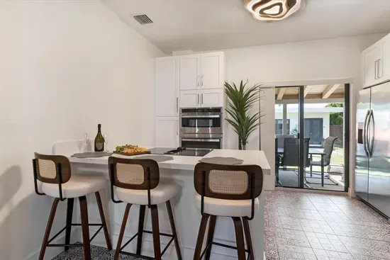 Kitchen and breakfast bar