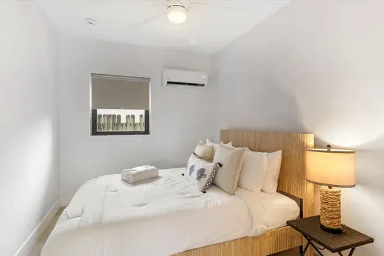 Master bedrooom with king bed in adjacent unit