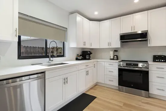 Well equipped kitchen in adjacent unit