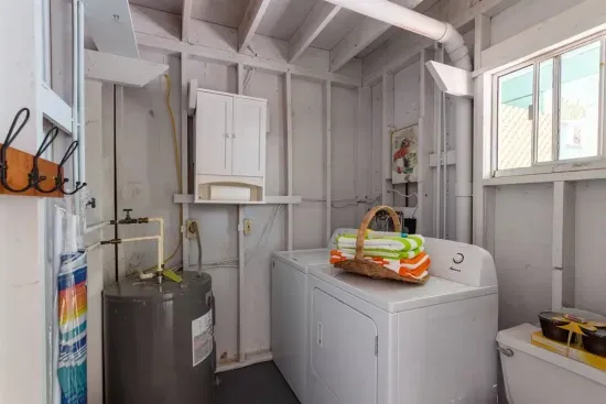 Your own Washer/Dryer, laundry pods, beach towels, umbrella, chairs, igloo and a pool toilet too!