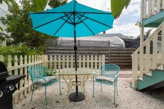 Your own little private guest area with bistro set and solar lit umbrella.