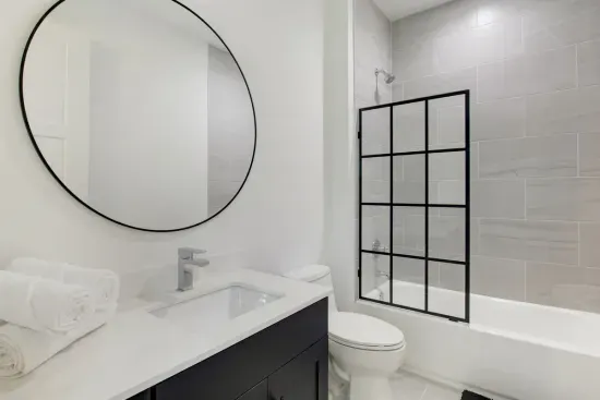 On-suite of bedroom two - Tub and shower