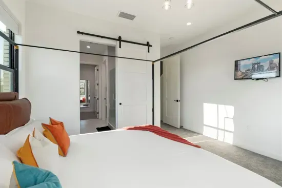 Master suite with king bed and TV