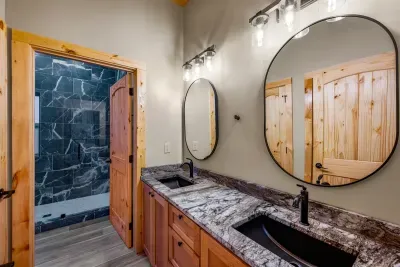 Here's one of the En-Suite Master Bathrooms, with two showerheads each.