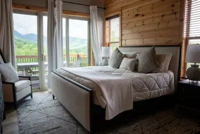 Another King Bedroom with a balcony and view of the mountains