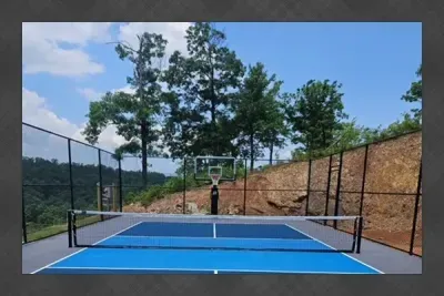 Play a game of pickleball or shoot baskets on your PRIVATE Sports Court!