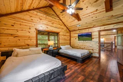 Double Queen En Suite Bedroom with Trundle Bed