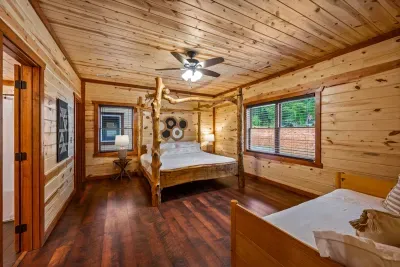 King En Suite Bedroom with Modern Rustic Furniture and Trundle Bed