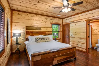 King EnSuite Bedroom with Modern Rustic Furniture and Trundle Bed