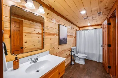 One of the EIGHT En Suite Bathrooms!