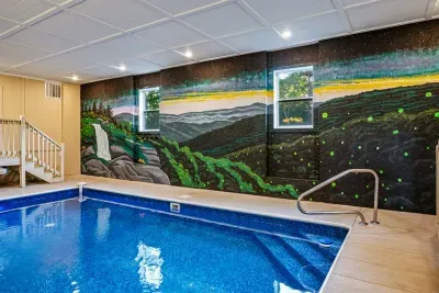 Heated Indoor Pool with Blacklight Mural