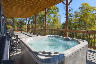 Lounge in the hot tub on the deck while enjoying the crisp mountain air and stunning views.