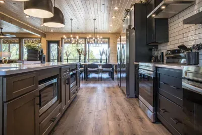 Step into a chef’s paradise! This fully equipped modern kitchen features dual high-end appliances, ample counter space, and stunning views—perfect for cooking and gathering with loved ones.