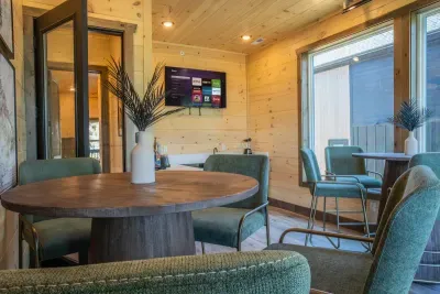 Fully stocked coffee bar with oversized windows to the expansive mountain views.