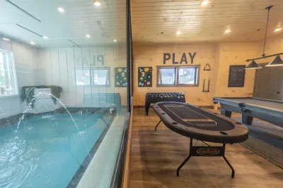 Escape to relaxation by jumping into your perfectly heated year-round indoor pool with waterfall and arcing deck jets.