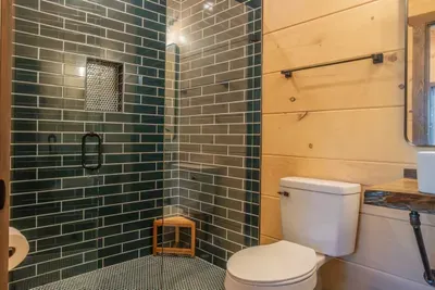Full shower in one of the en suite bathrooms.