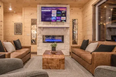 Cody indoor gathering area around the fire and TV