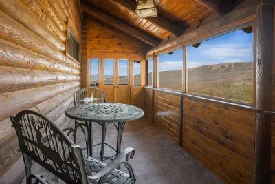 Enjoy a cup of coffee in the enclosed deck located near the hot tub.