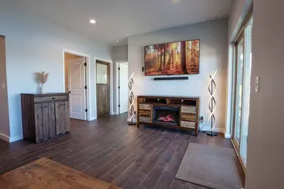 Downstairs you'll find a fireplace and 65" 4k TV.