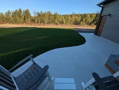 A perfect place to have your morning coffee, facing the woods.