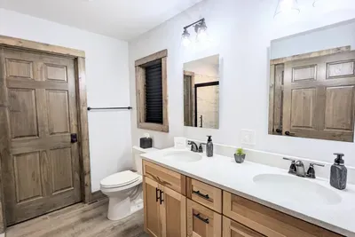 This full bathroom is attached to the primary suite. (UPSTAIRS)
Double sinks in the primary bath makes getting ready a breeze!