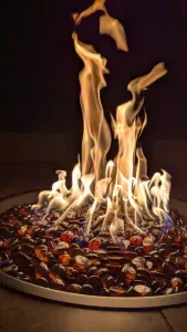 The table on the deck offers a propane fire in the center.