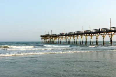 long-fishing-pier-into-the-atlantic-ocean-sunset-2026-01-11-10-00-31-utc