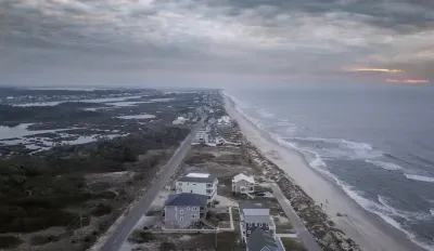 aerial-view-of-an-early-morning-sunrise-over-surf-2026-01-08-00-25-57-utc