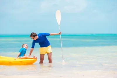 young-father-and-little-kid-kayaking-at-the-sea-2026-01-08-00-22-25-utc