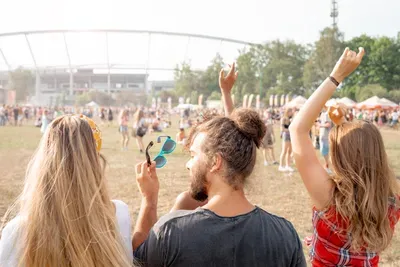 group-of-friends-having-fun-at-summer-music-festiv-2026-01-05-23-14-19-utc