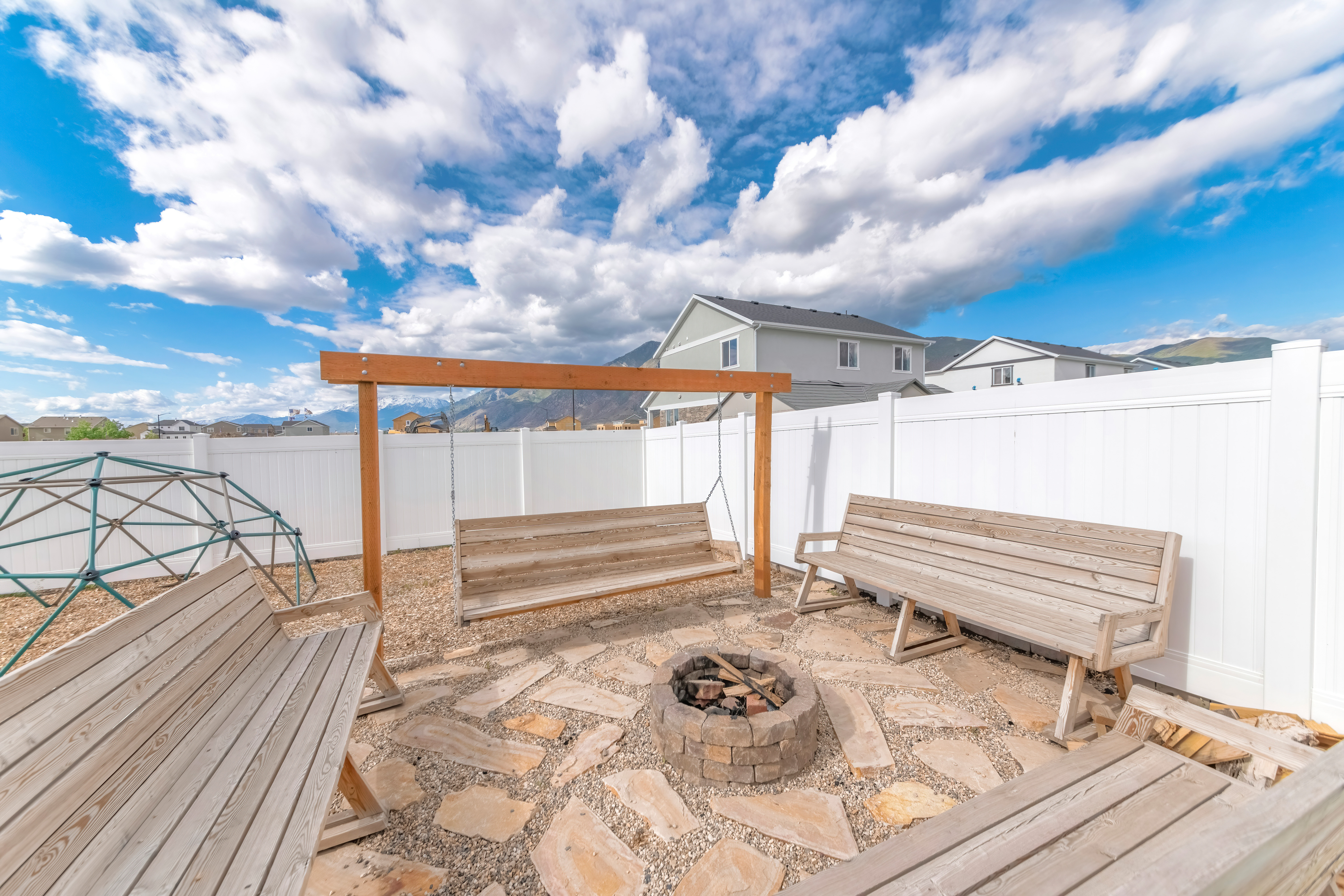 beautiful-sunny-backyard-idea-with-wooden-benches-2026-03-18-09-20-52-utc