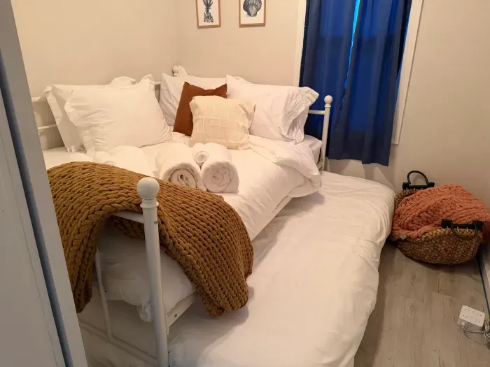 “Flexible sleeping space with additional bed—great for families or small groups.