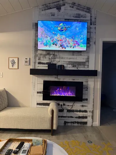 Rainy day? Family game night? Challenge friends to Mario Kart on the Nintendo Switch 2 while relaxing by the fireplace