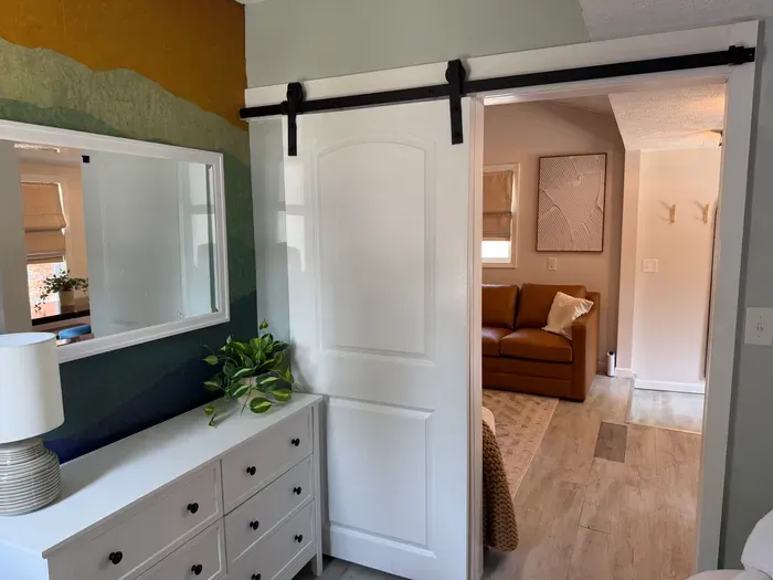 Spacious area with a full-length mirror to get ready for the day.