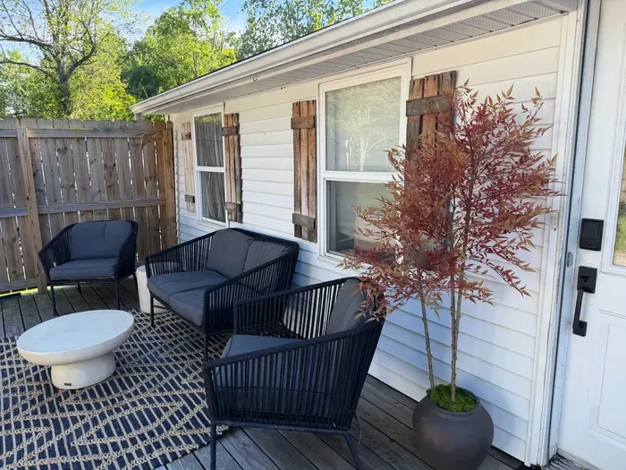 Slow mornings start here. Sip coffee under the umbrella, unwind with a book, or plan the day's adventures before heading to the lake, wineries, or SPIRE.