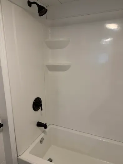 Clean, simple shower setup with everything you need to refresh and reset.