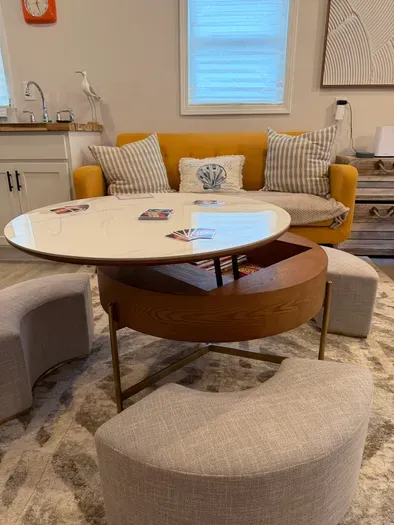 Hidden games and flexible seating create the perfect spot for family game nights and rainy-day fun.