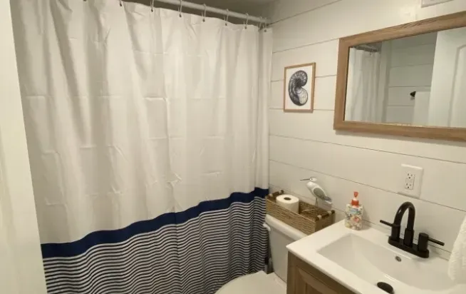 Clean, simple bathroom with everything you need for a comfortable stay.