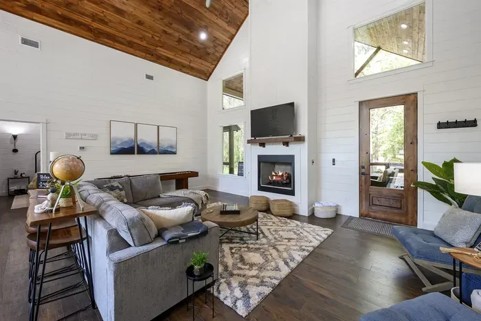 Spacious living room with a fireplace and smart TV