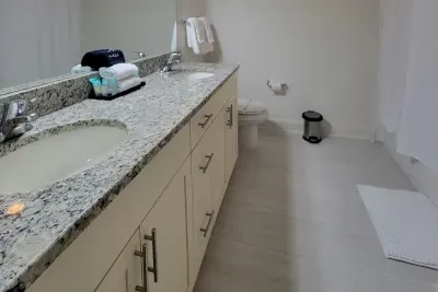 Double sink vanity on upstairs bathroom.