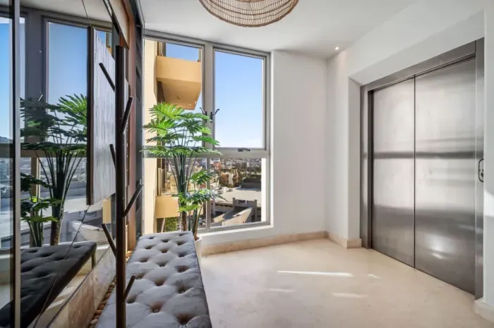 Elevator opens directly into elevator