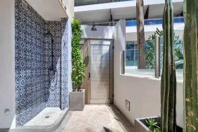 Beach access door with shower