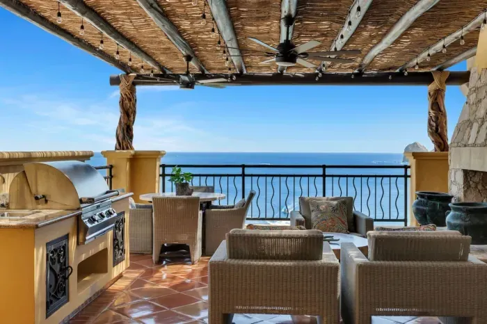 Grill and stay warm on this beachfront patio