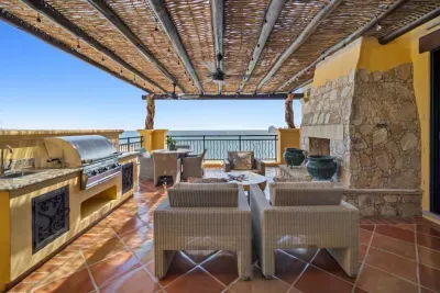 Patio with grill and fireplace